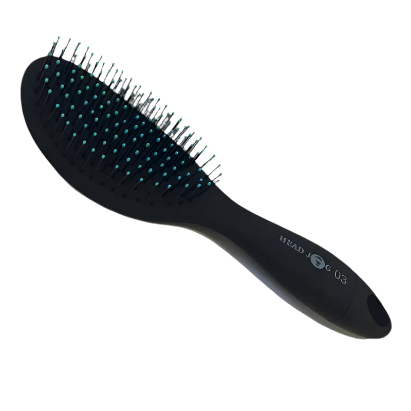 Head Jog Black oval paddle brush with detachable brush cleaner.