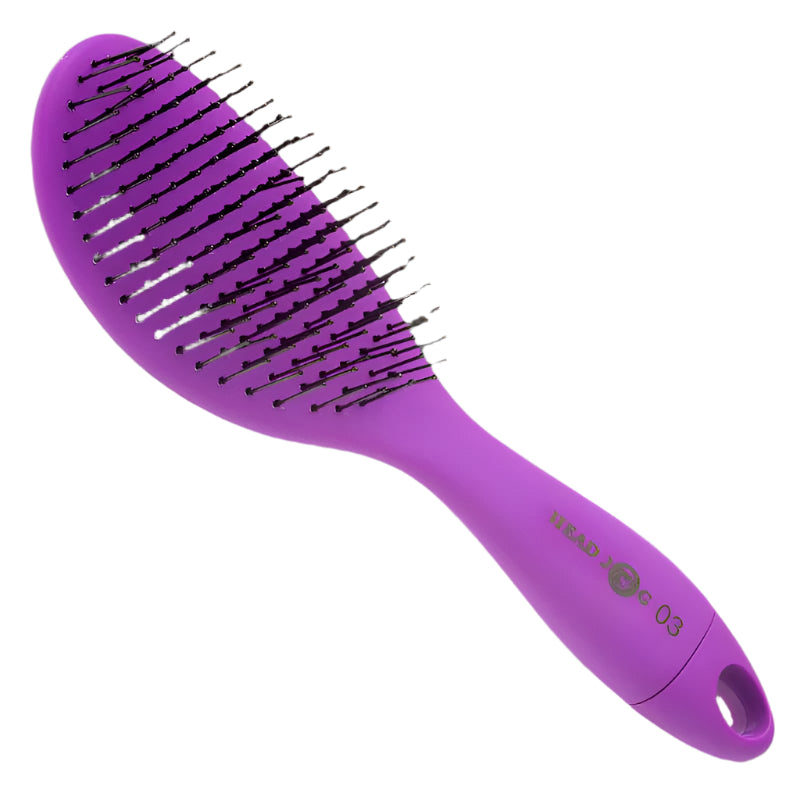 Head Jog Purple oval paddle brush with detachable brush cleaner.